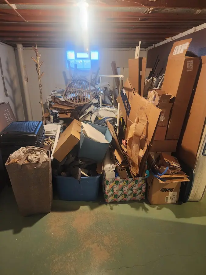 Roll-off dumpster container at job site for Cleanout Dumpster Rental in Rochester